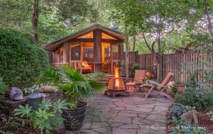 welcoming screened outdoor pavilion with patio