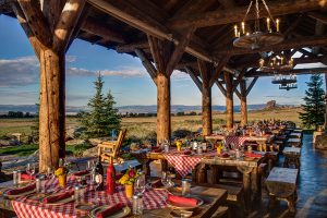 Chuckwagon, dining in an expansive outdoor setting, at Brush Creek Ranch