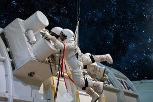 Astronauts in an image provided by U.S. Space & Rocket Center